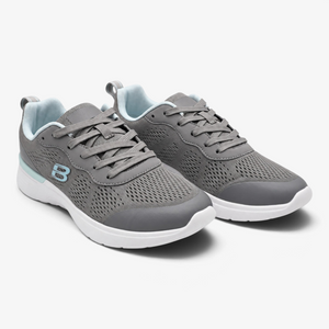 Zapatillas deportivas Nuxual Demax para mujer en color gris con detalles azul celeste y plantilla Double Memory