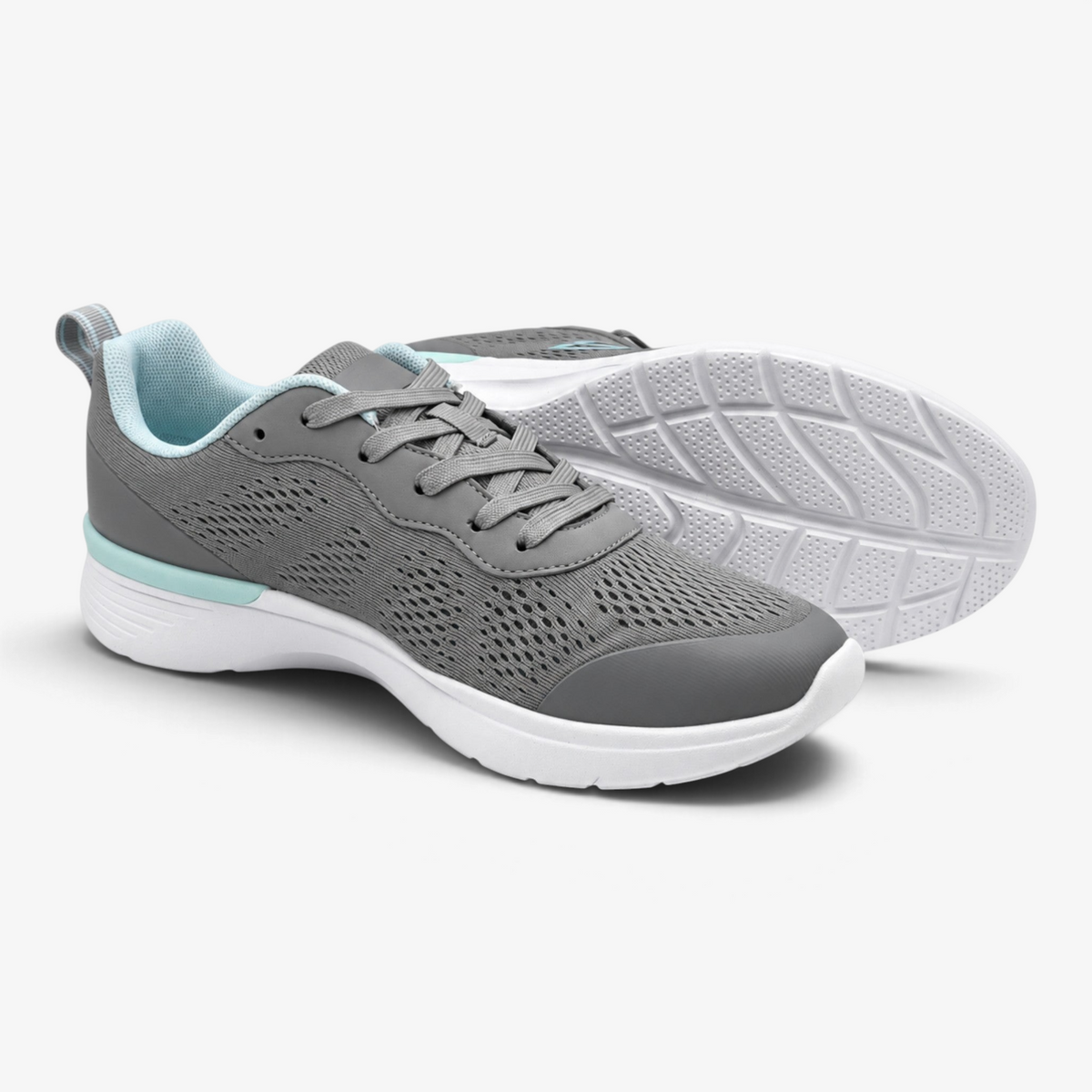 Zapatillas deportivas Nuxual Demax para mujer en color gris con detalles azul celeste y suela blanca acolchada