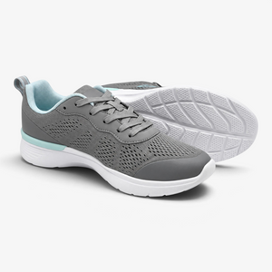 Zapatillas deportivas Nuxual Demax para mujer en color gris con detalles azul celeste y suela blanca acolchada