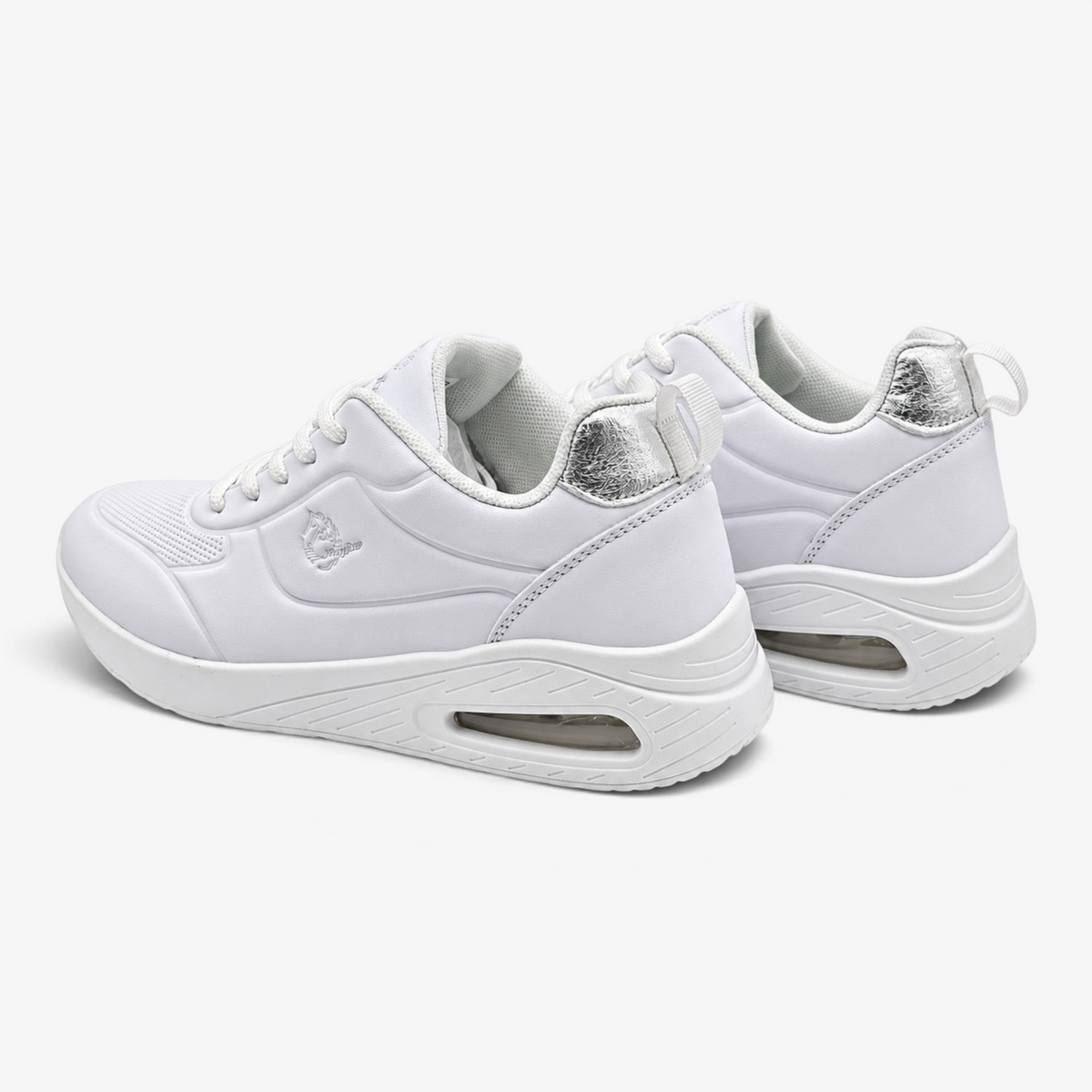 Zapatillas casual Nuxual J'hayber Cherte blancas con detalle metalizado en el talón y cámara de aire visible.