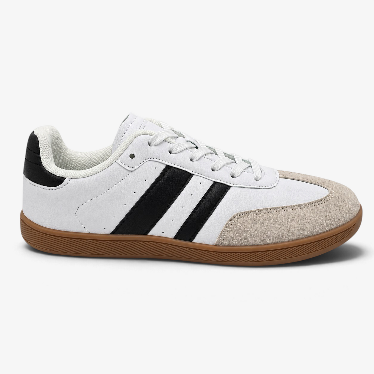 Zapatillas barefoot Nuxual blancas y negras con diseño deportivo, horma amplia y suela flexible de color caramelo